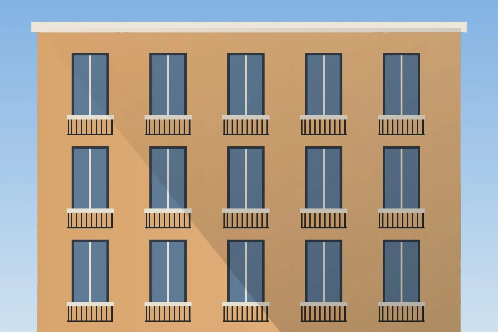 Fachada de ladrillo con balcones de forja
