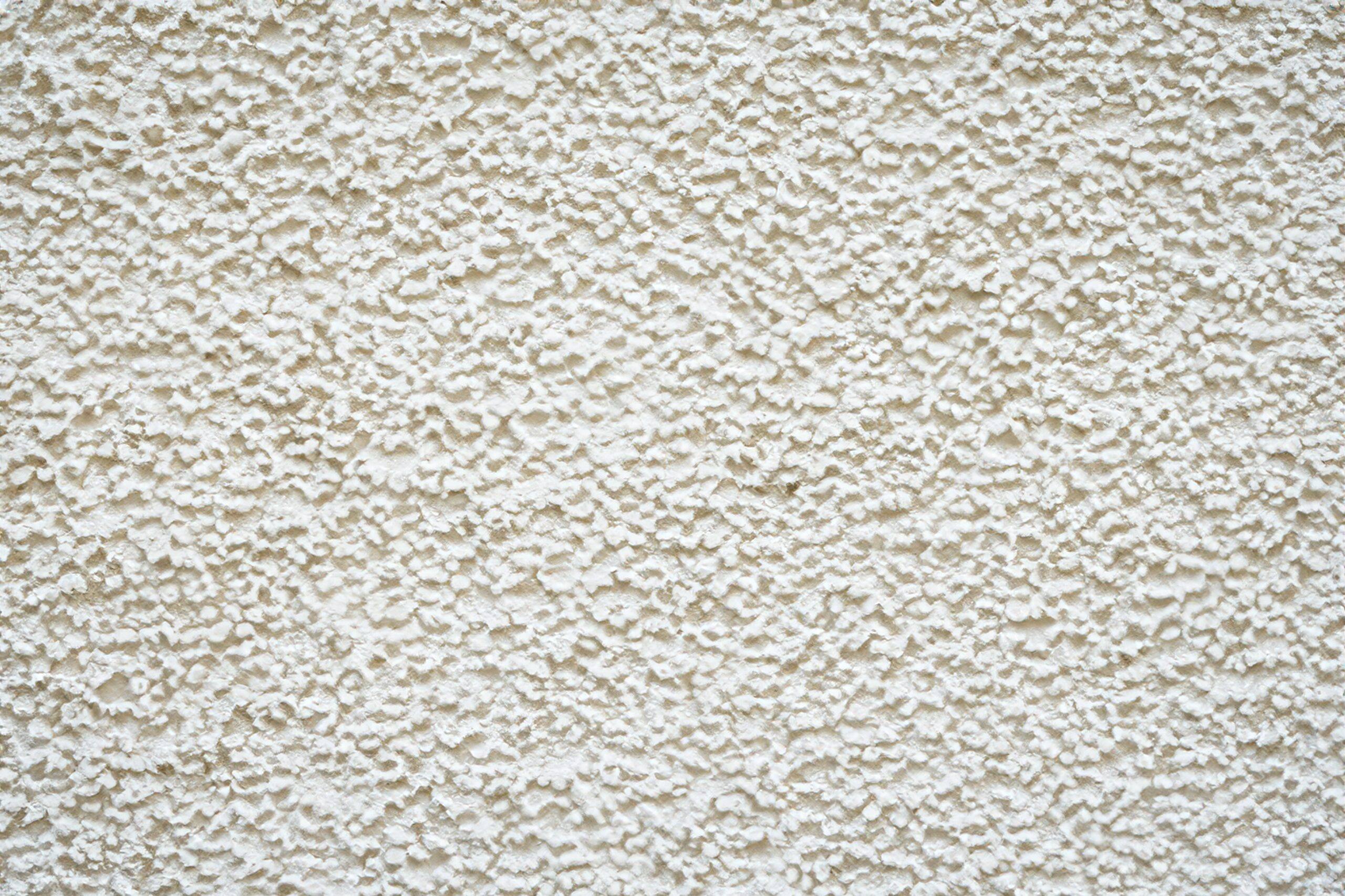 Textura de gotelé blanco con relieve marcado