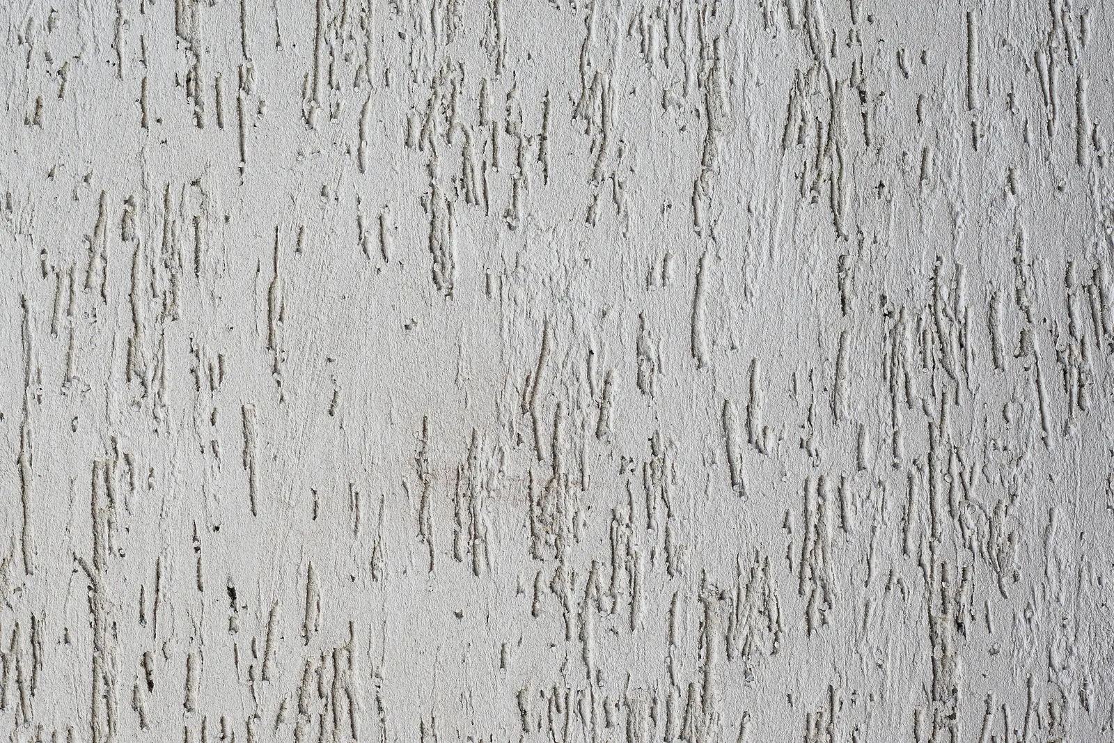 Pared con textura rayada en tono gris claro, vista de cerca